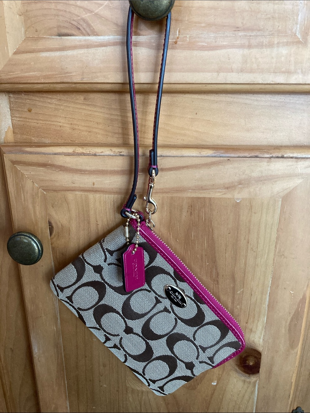 Coach Signature Canvas Wristlet in Brown and Magenta